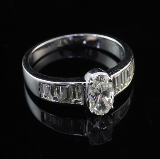 A 14ct white gold and diamond dress ring, size N.